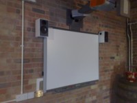 Whiteboard with projector built in above